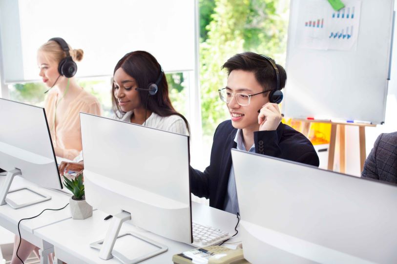 team of helpline operators with headsets consultin 2023 11 27 05 32 50 utc 1 scaled 1 1 1